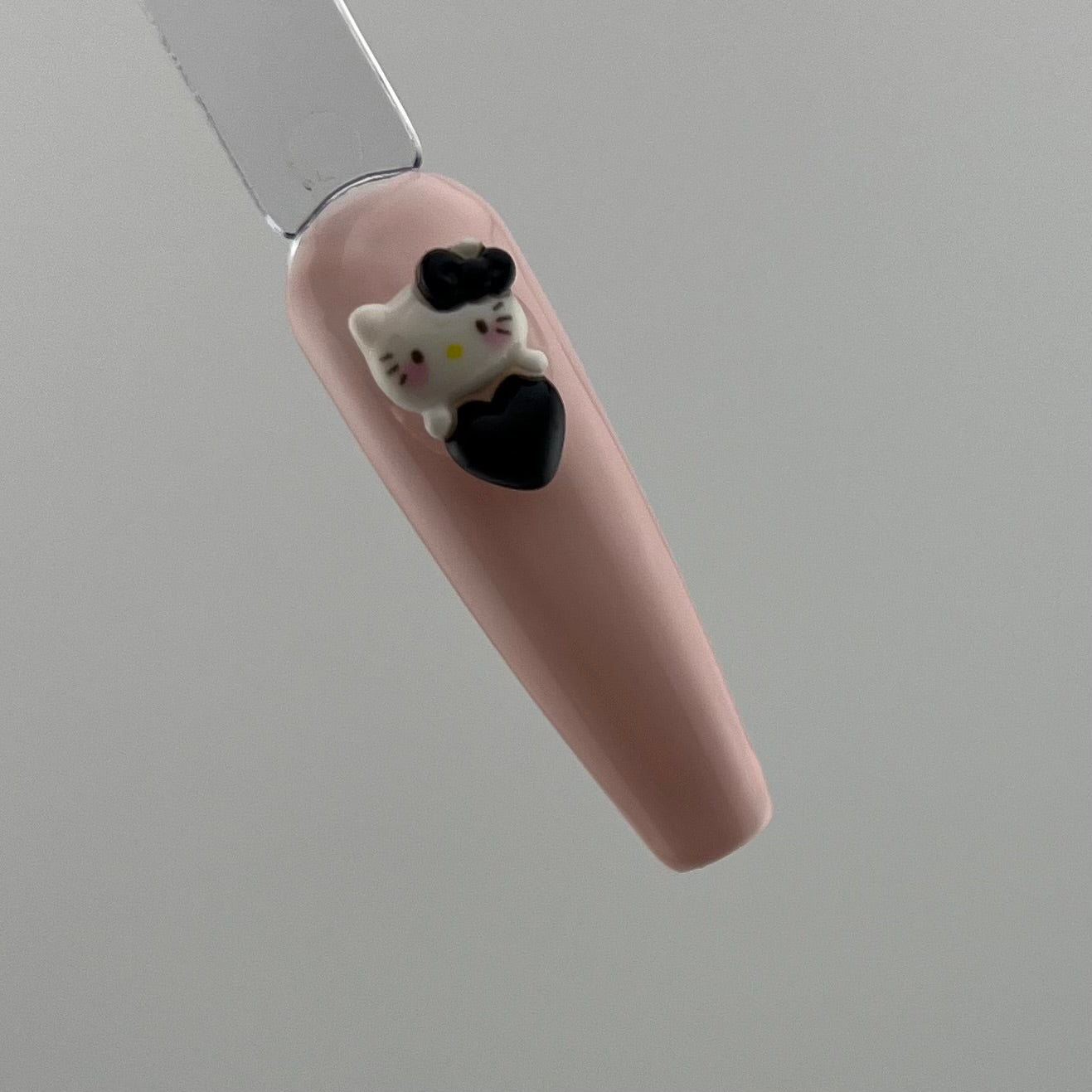 Hello Kitty with Black Heart and Bow